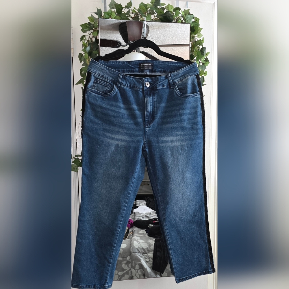 Blue jeans with black velvet glitter trim